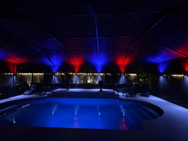 Pool cage with patriotic red white and blue LED scene for Fourth of July in Brandon